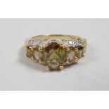 A 10ct yellow gold, tourmaline and diamond set dress ring, approximate size 'P'