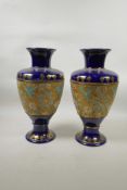 A pair of Doulton Slater's Patent vases, 13" high, stamps to base, A/F