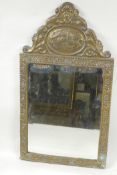 A C19th brass pier glass mirror with bevelled plate, 11" x 20"
