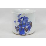 A Chinese ceramic brush pot, decorated in blue and white with iron red highlights, 6 figure