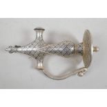 A Mughal style white metal sword handle, 7½" long
