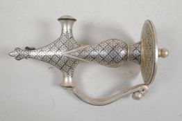 A Mughal style white metal sword handle, 7½" long