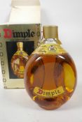 A one litre bottle of Dimple Haig Old Blended Scotch Whisky in presentation dimple bottle and box