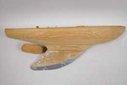 An antique scratch built pond yacht hull with lead weighted keel, 19" long