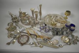 A quantity of silver plated wares including cruet sets, figurines, flatware etc