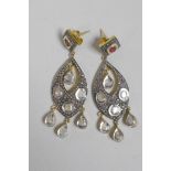 A pair of silver gilt pendant earrings set with Indian uncut diamonds, 2½" drop