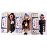 Three Pelham Puppets in brown boxes