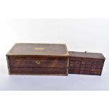 ^ An early Victorian rosewood and brass mounted rosewood writing slope