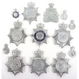 Eight Obsolete Queens Crown Police Helmet Plates