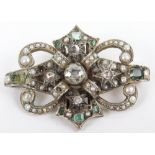 A diamond, peridot, pearl and topaz set brooch