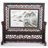 A late 19th/early 20th century Chinese porcelain handpainted table screen, on hardwood mount