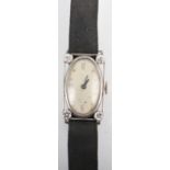 An Art Deco Swiss ladies four diamond set platinum wristwatch