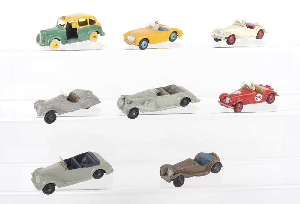 Eight Unboxed Dinky Toys Cars