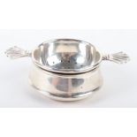 A silver tea strainer on stand, Birmingham 1920,