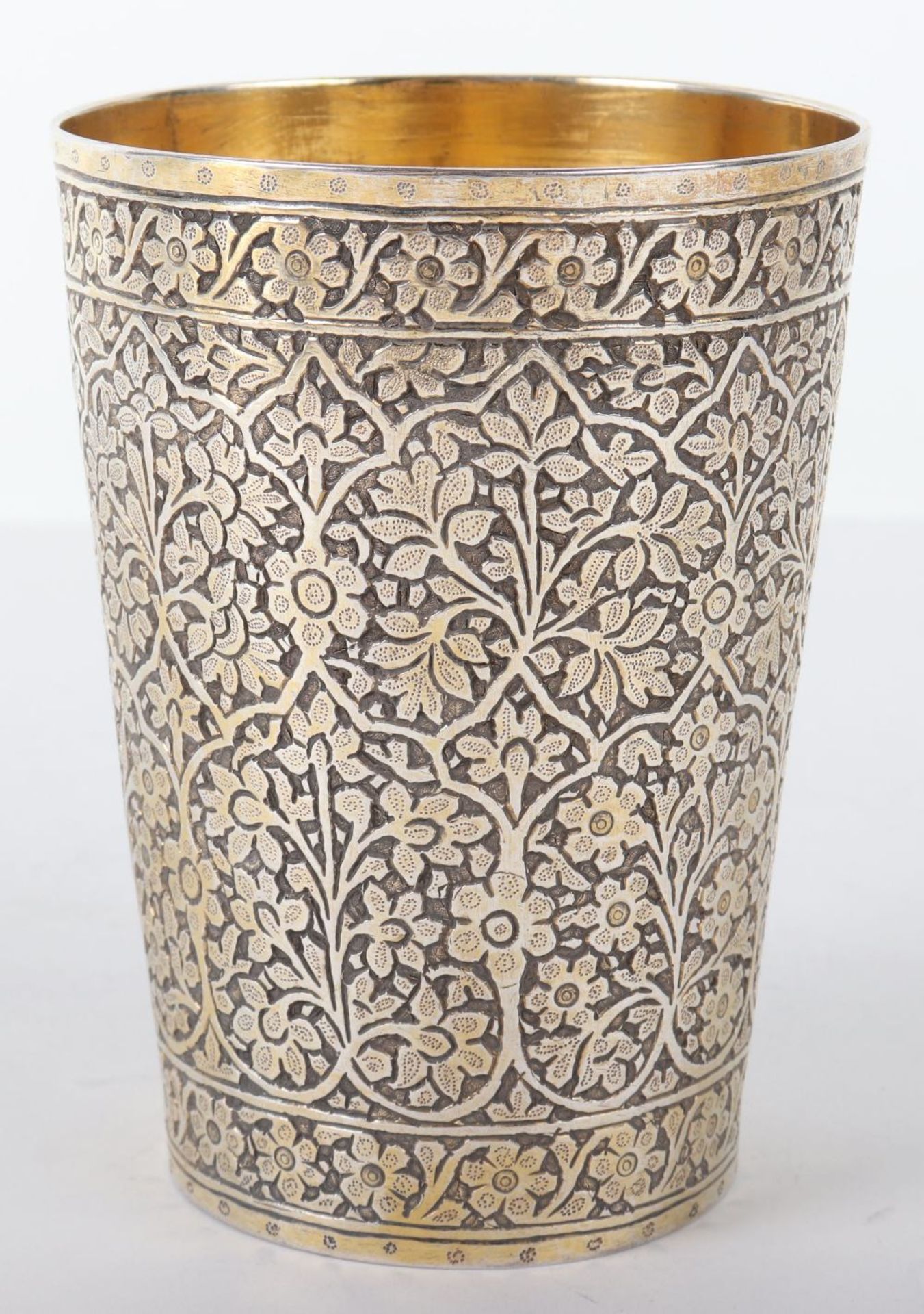 A good Persian silver gilt beaker