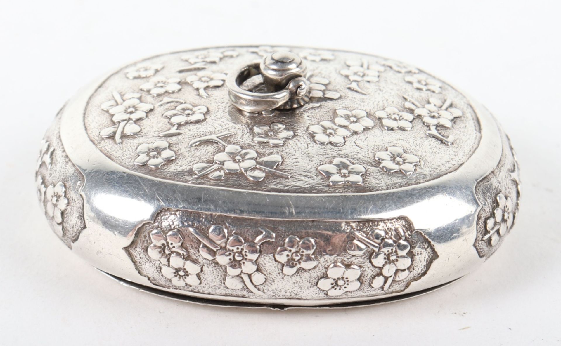 A rare late 17th/early 18th century squeeze sided silver snuff box in the Chinese style,