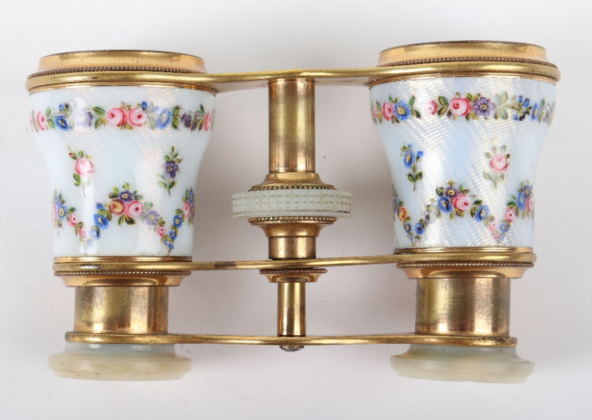 A pair of mother of pearl and guilloche enamel opera glasses
