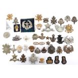 Quantity of British Military Cap Badges etc