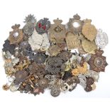 Large Quantity of British Military Helmet Plates, Shoulder Belt Plates and Headdress Badges etc