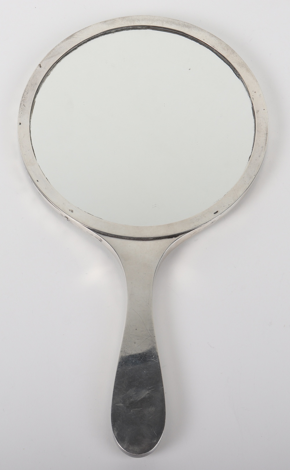 A 20th century silver and enamel hand mirror, London 1959