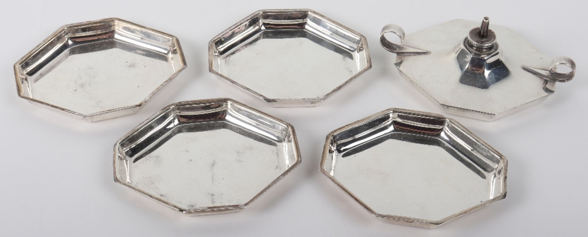 An Art Deco table lighter and dishes, Hukin & Heath, London 1935