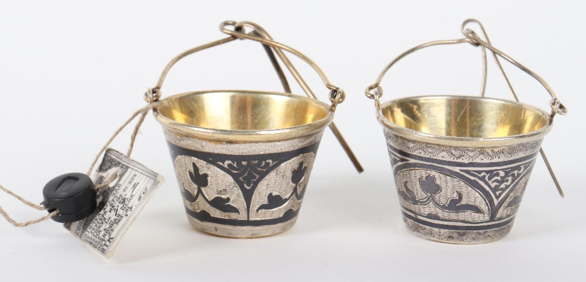 A pair of Russian silver (.875) tea strainers, 1980’s