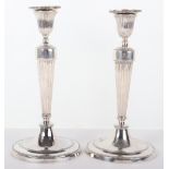 A pair of Georgian silver candlesticks, John Winter & Co, Sheffield 1773