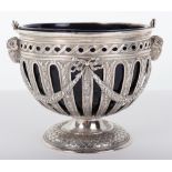An unusual early 20th century silver and glass sugar bowl marked 930 to base, London 1902, John Geor