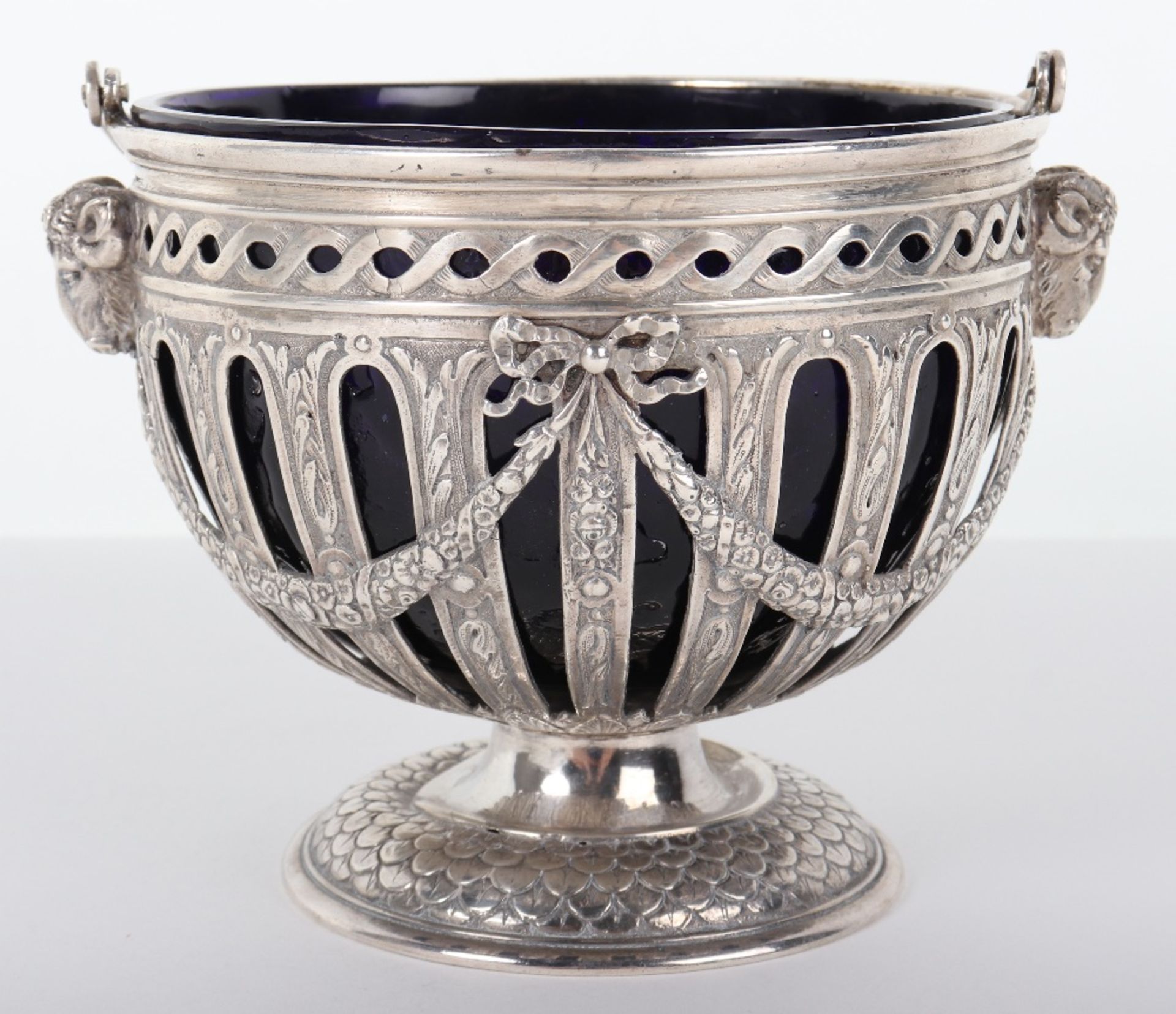 An unusual early 20th century silver and glass sugar bowl marked 930 to base, London 1902, John Geor