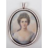 ^A 19th century miniature bust portrait of a lady, on ivory