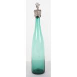 A Victorian silver bottle stopper on a green glass bottle, Charles Reily & George Storer, London 184