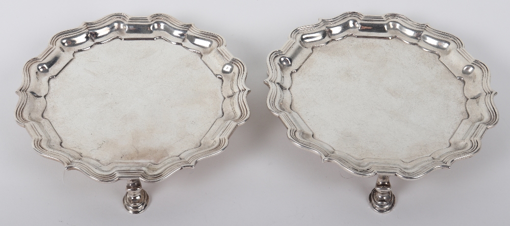 A pair of George II small salvers, Samuel Courtauld, London 1751