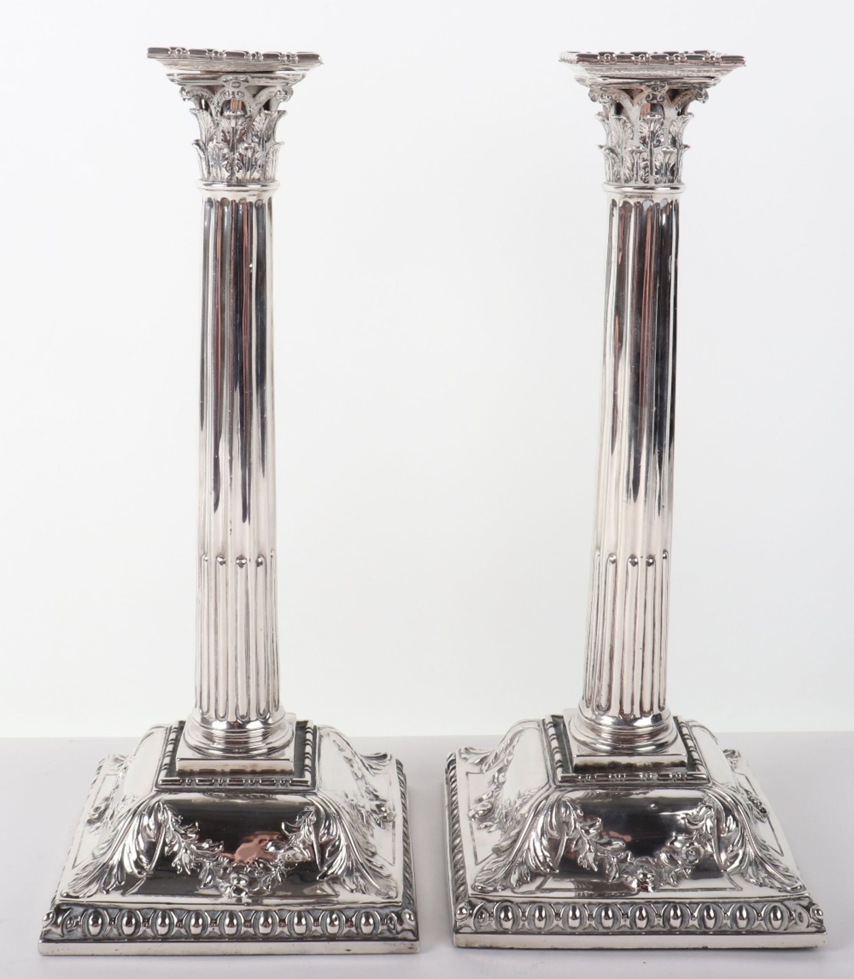 A pair of large George II candlesticks, London 1756
