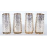 A rare set of four Stuart Devlin beakers