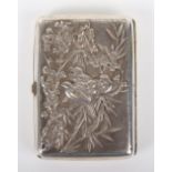 A Chinese silver cigarette case, unmarked