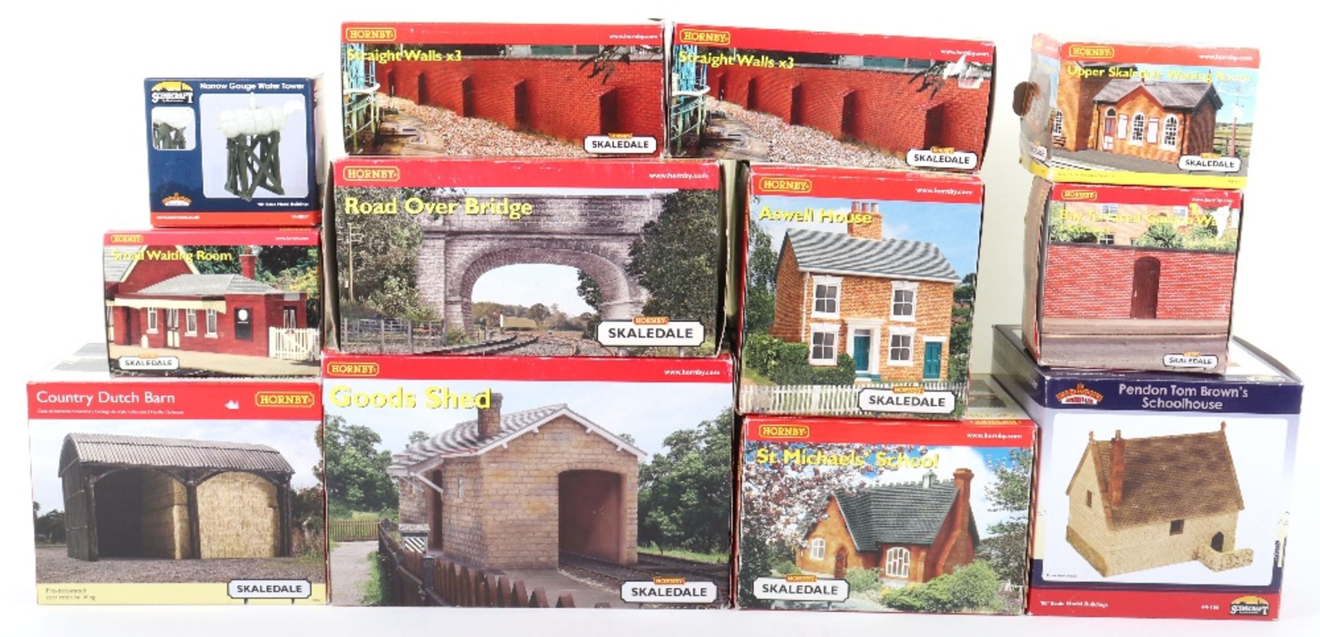 Collection of boxed Hornby track side buildings and accessories,