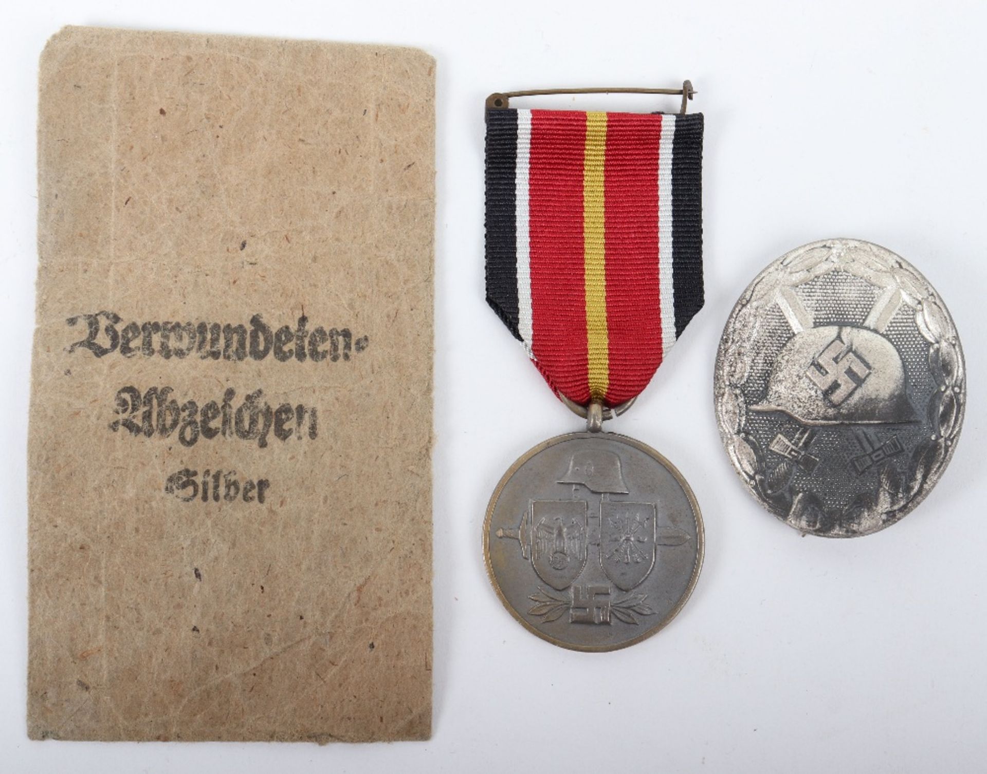 WW2 German Silver Wound Badge and Spanish Blue Division Medal.