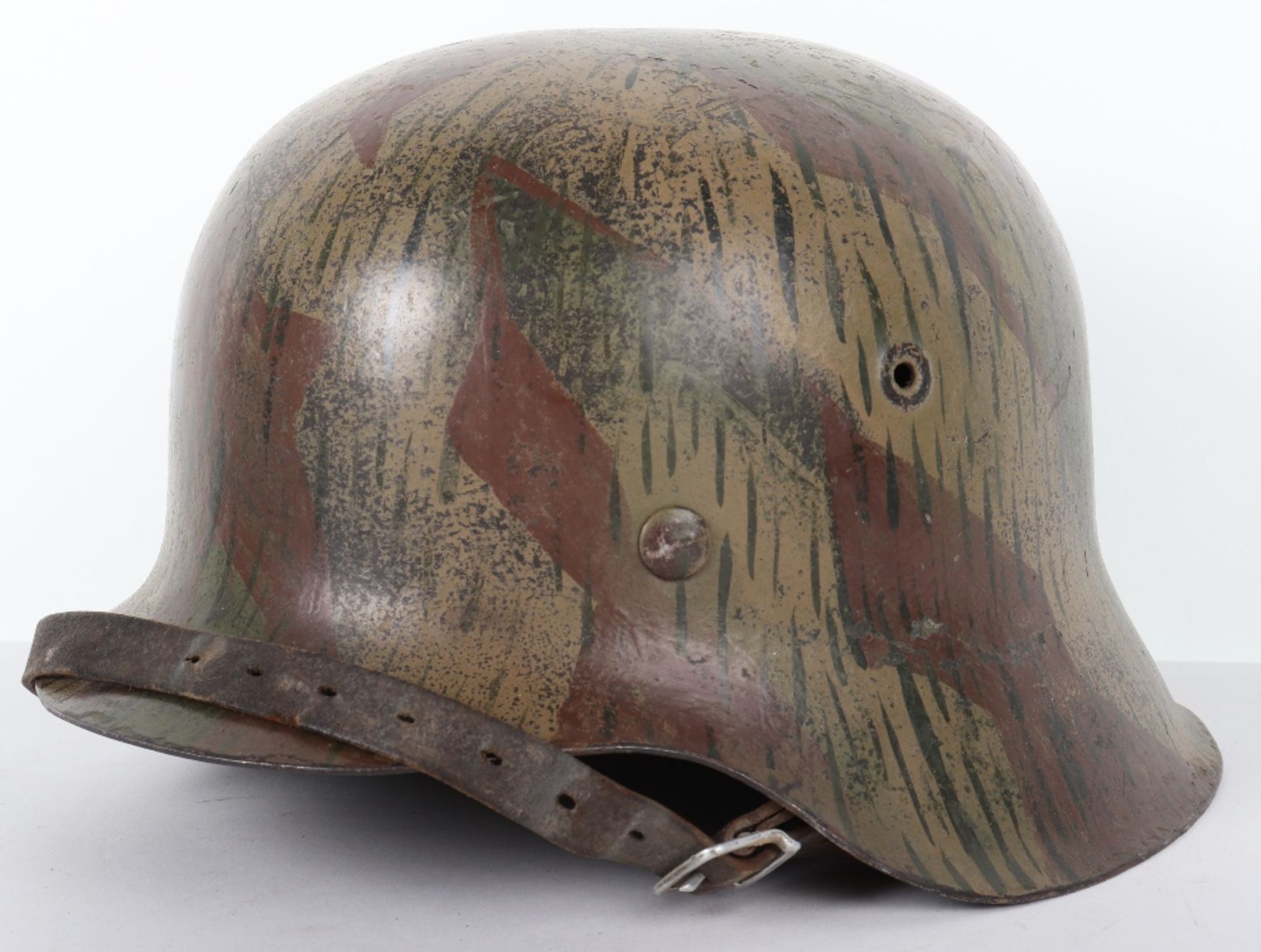 German Army / Luftwaffe M-42 Battle Damaged Steel Combat Helmet