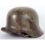 German Army / Luftwaffe M-42 Battle Damaged Steel Combat Helmet