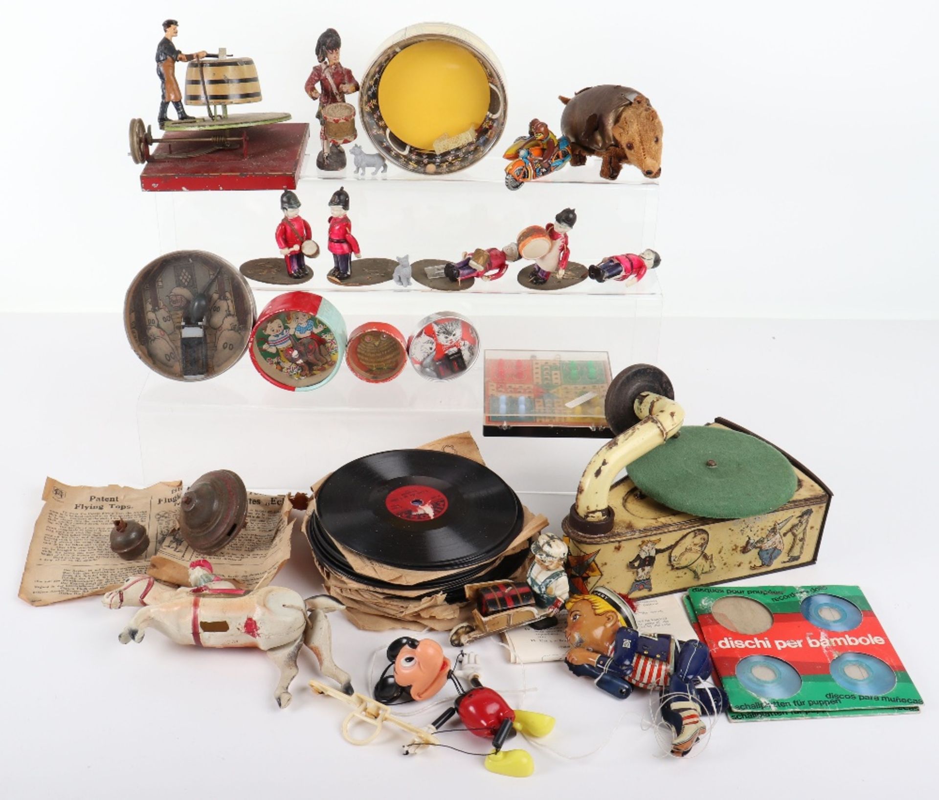 Selection of playworn tinplate and other toys,