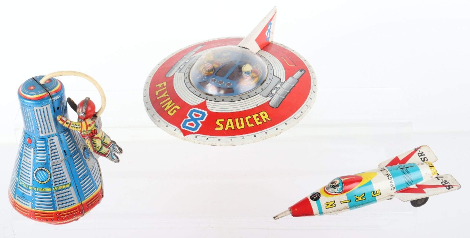 Three Japanese tinplate friction driven Space toys, 1950s/60s