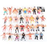 Quantity of Vintage 1990s Hasbro and Galoob WWF WCW Wrestling figures