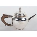 A small sliver teapot, Carrington & Co, London 1904