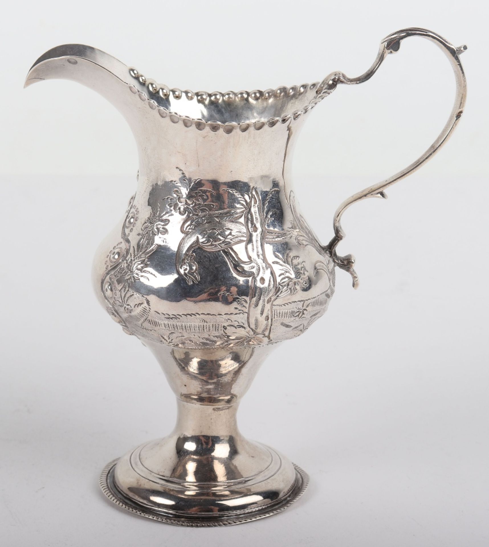 A Georgian cream jug, London 1781 - Image 2 of 7