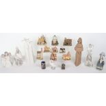 A selection of seven Lladro figures and David Winter Cottages