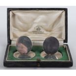 A pair of silver menu holders, London 1927