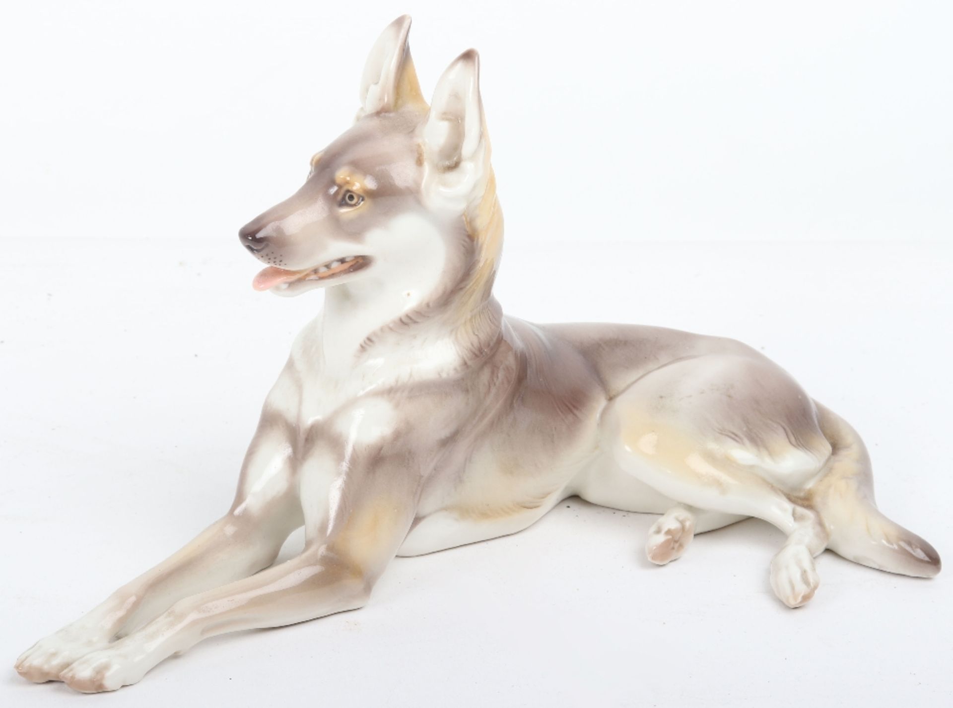 A 1930’s Allach style porcelain dog, by Karner