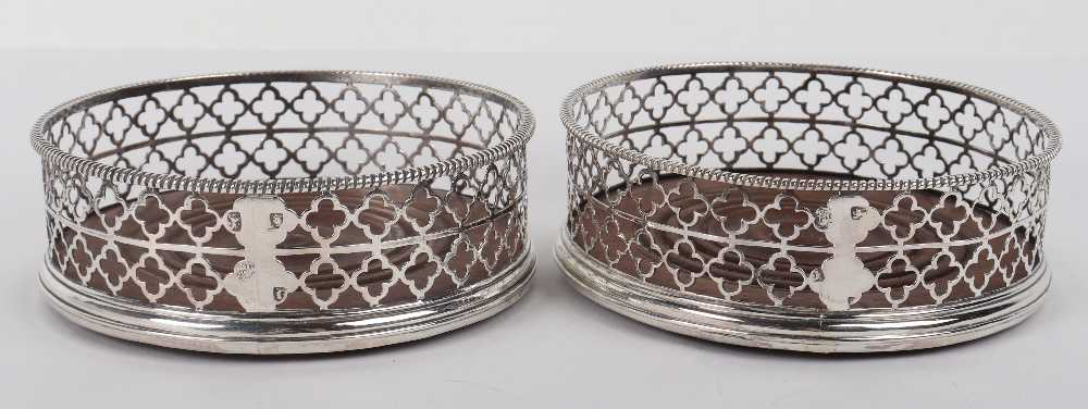 A pair of George III silver coasters, Thomas & William Chawner, London 1768