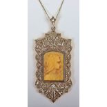 A Continental 18ct gold and diamond religious pendant