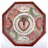 An early 19th century sailor’s shell valentine of typical octagonal form